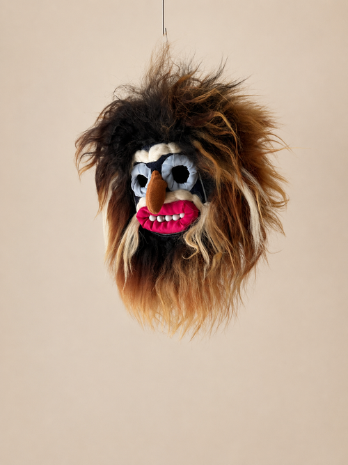 Brown Furry Traditional mini mask with a neutral background